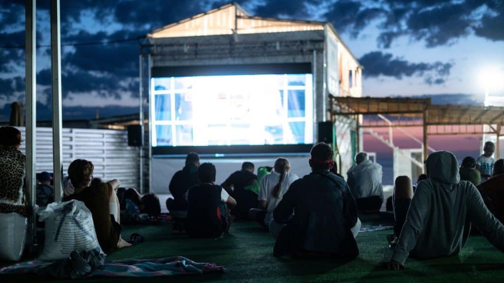 An outdoor movie night can be a great way to celebrate a birthday